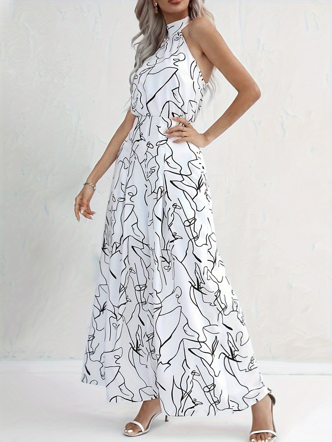 Women's Black Maxi Dress – Elegant Halter Neck, Fitted Waist, Abstract Print, Flowing Silhouette
