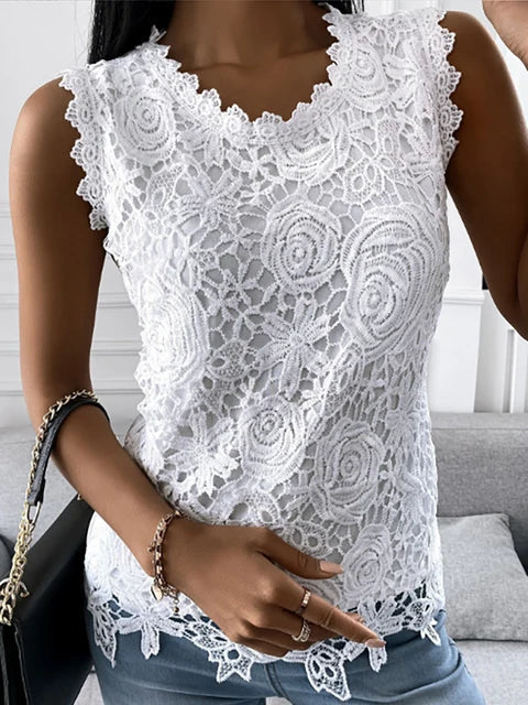 https://cdn.shopify.com/s/files/1/0822/2661/0521/files/Elegante-Kant-Patchwork-Mouwloze-Blouse-Sexy-Vintage-Slanke-Shirt-Vrouwen-Zomer-Casual-O-Hals-Effen-Tanks.jpg_640x640_8a5971ff-af28-4564-b57a-a483427ddb11.jpg?v=1715751444