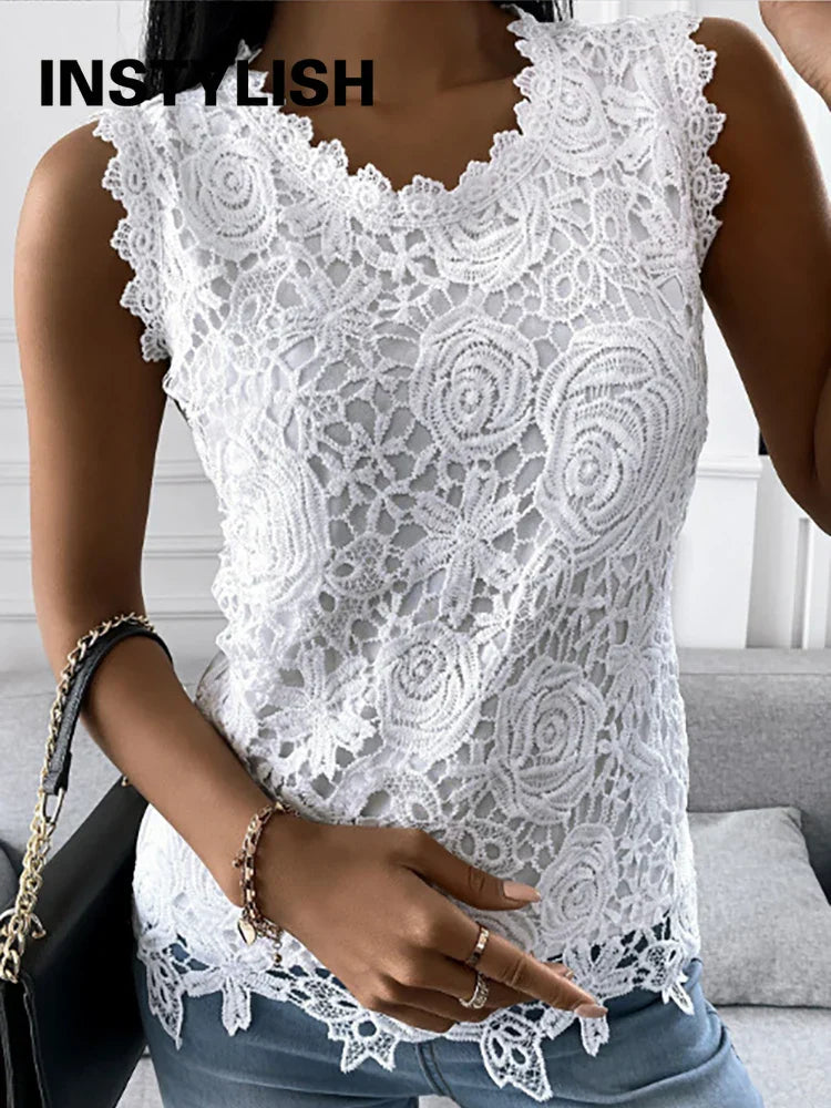 https://cdn.shopify.com/s/files/1/0822/2661/0521/files/Elegante-Kant-Patchwork-Mouwloze-Blouse-Sexy-Vintage-Slanke-Shirt-Vrouwen-Zomer-Casual-O-Hals-Effen-Tanks_6b754728-1687-4198-a945-b87c4030a042.webp?v=1715751444