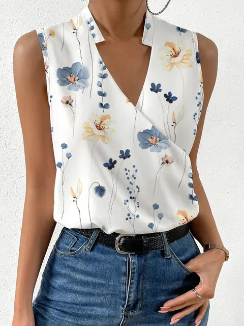 https://cdn.shopify.com/s/files/1/0822/2661/0521/files/Mode-V-Hals-Mouwloze-Print-Vrouwen-Tops-En-Blouses-2023-Zomer-Casual-Witte-Tank-Top-Femme.jpg_640x640_aa6b3682-1530-4be7-aa2e-97b7ec795b63.webp?v=1717637175